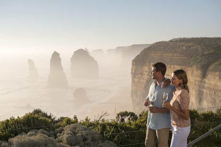 Stunning views from the 12 Apostles, the most iconic destination along the Great Ocean Road. Discover the beauty of these famous limestone pillars against the rugged and windswept coastline. 
