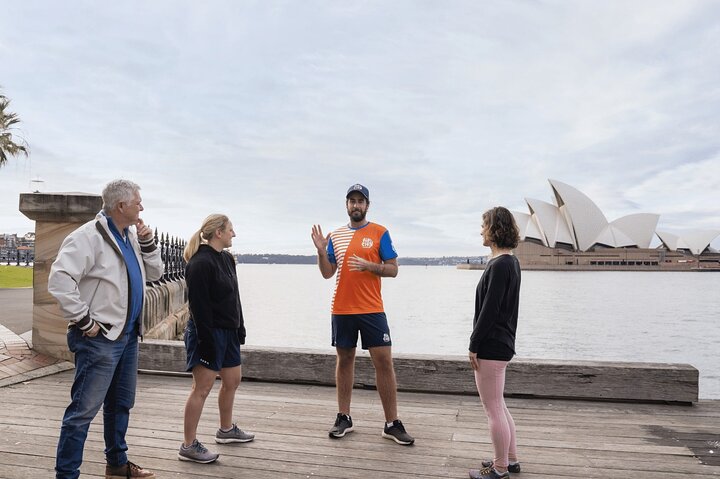 Our tour guide introducing our guests to the Sydney Opera House